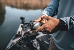 Quantum Energy S3 Baitcasting Reel 16 Quantum Energy S3 Baitcasting Reel -Daiwa Store energy bc reel and rod closeup lifestyle